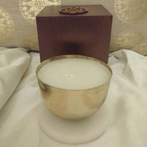 Brass Cup Candle With A White Marble Coaster