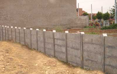 Prestressed Boundary Walls