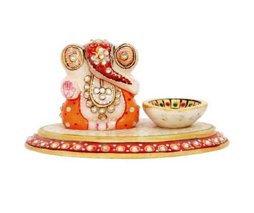 Ganesh Ji On Oval Chowki With Diya