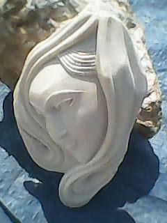 Marble Face Sculpture